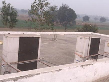 Cooling units on the roof of the mushroom growing chambers